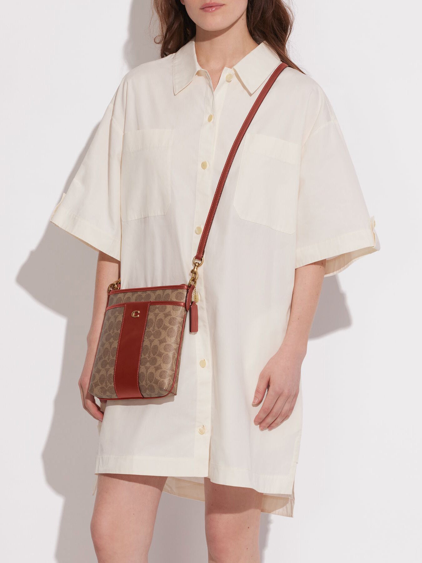 Kitt Messenger Crossbody In Colorblock Signature Canvas Tan Rust