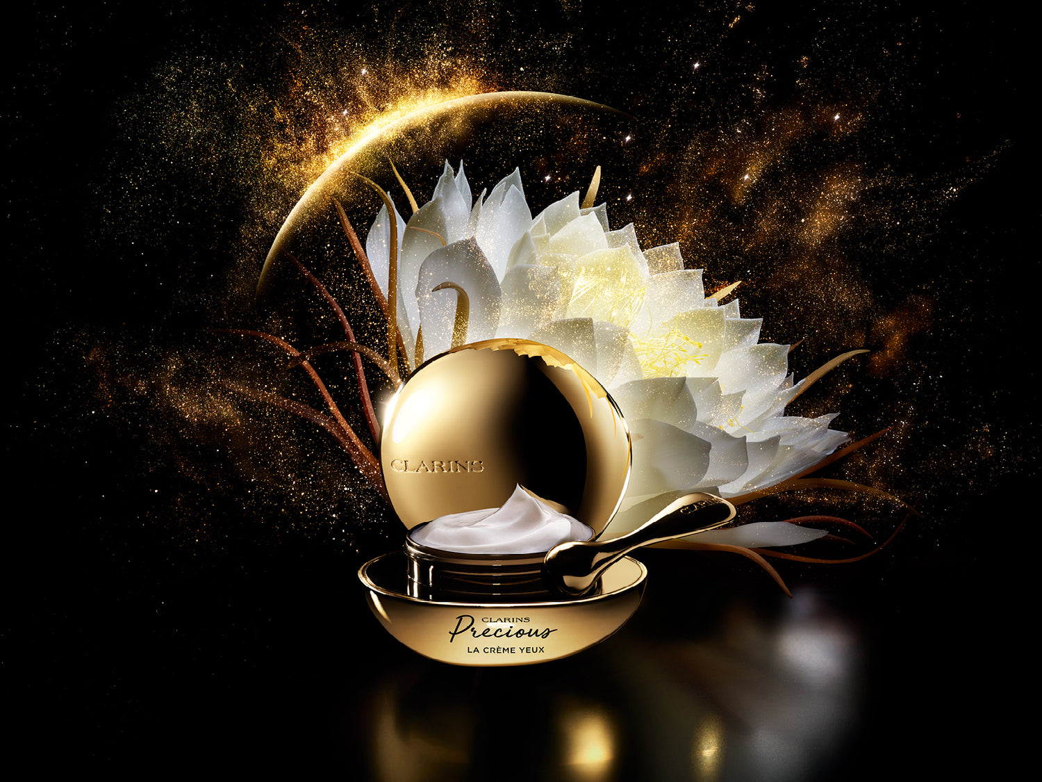 Luxurious cosmetic product with gold casing and white flowers on a dark background