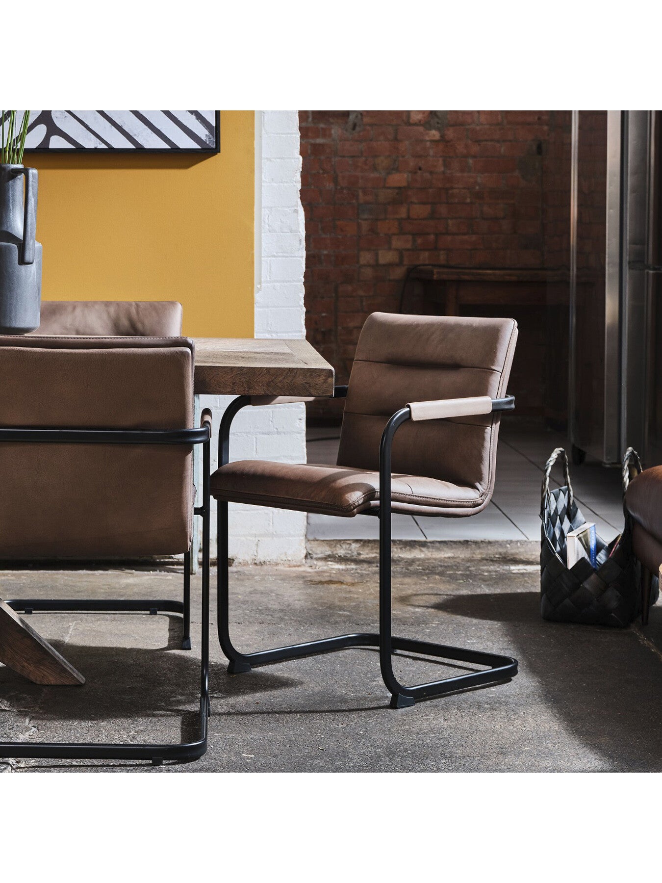 Rigel Leather Dining Armchair With Black Metal B
