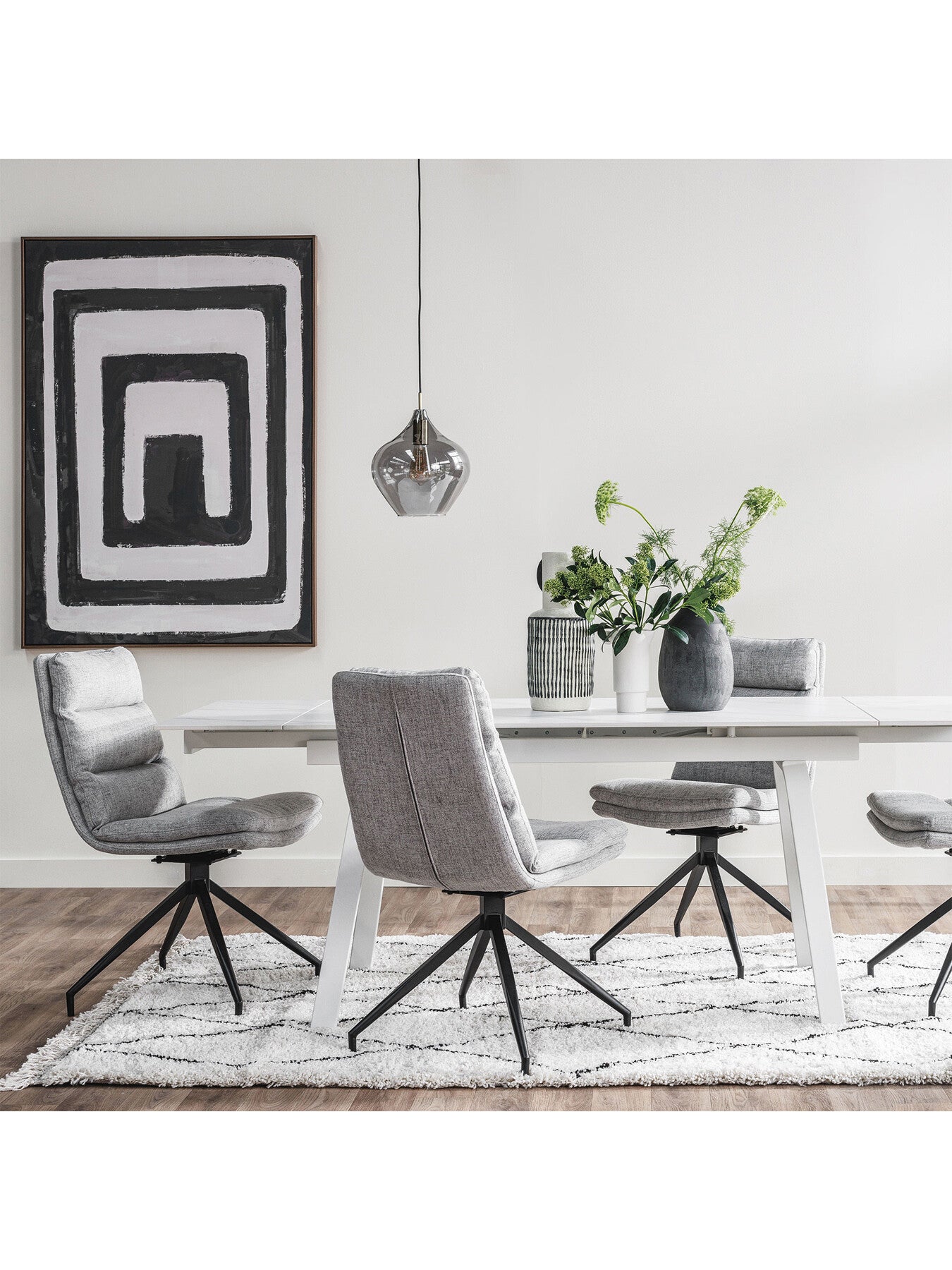 Eero Light Fabric Swivel Dining Chair With Black L