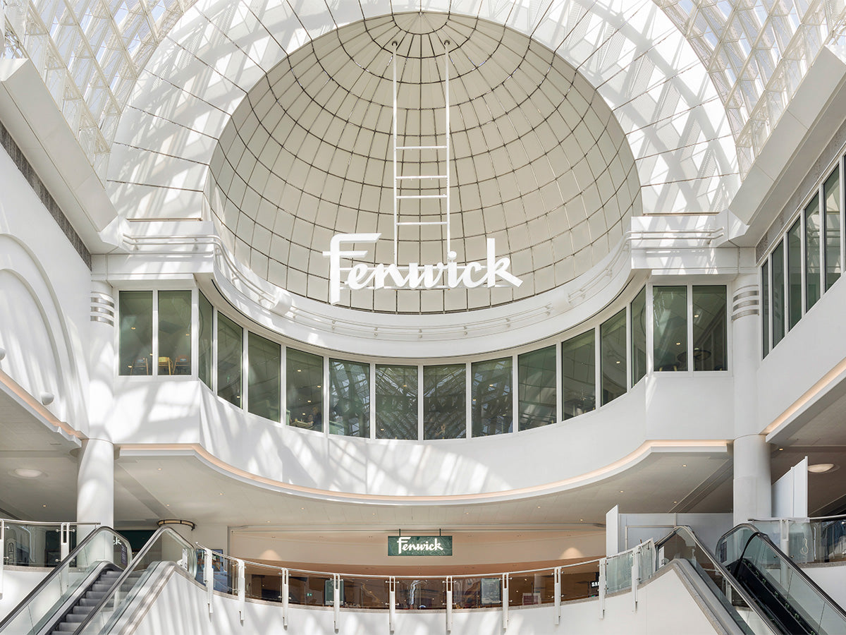 Mall interior with a large dome ceiling featuring the 'Ferwick' logo.