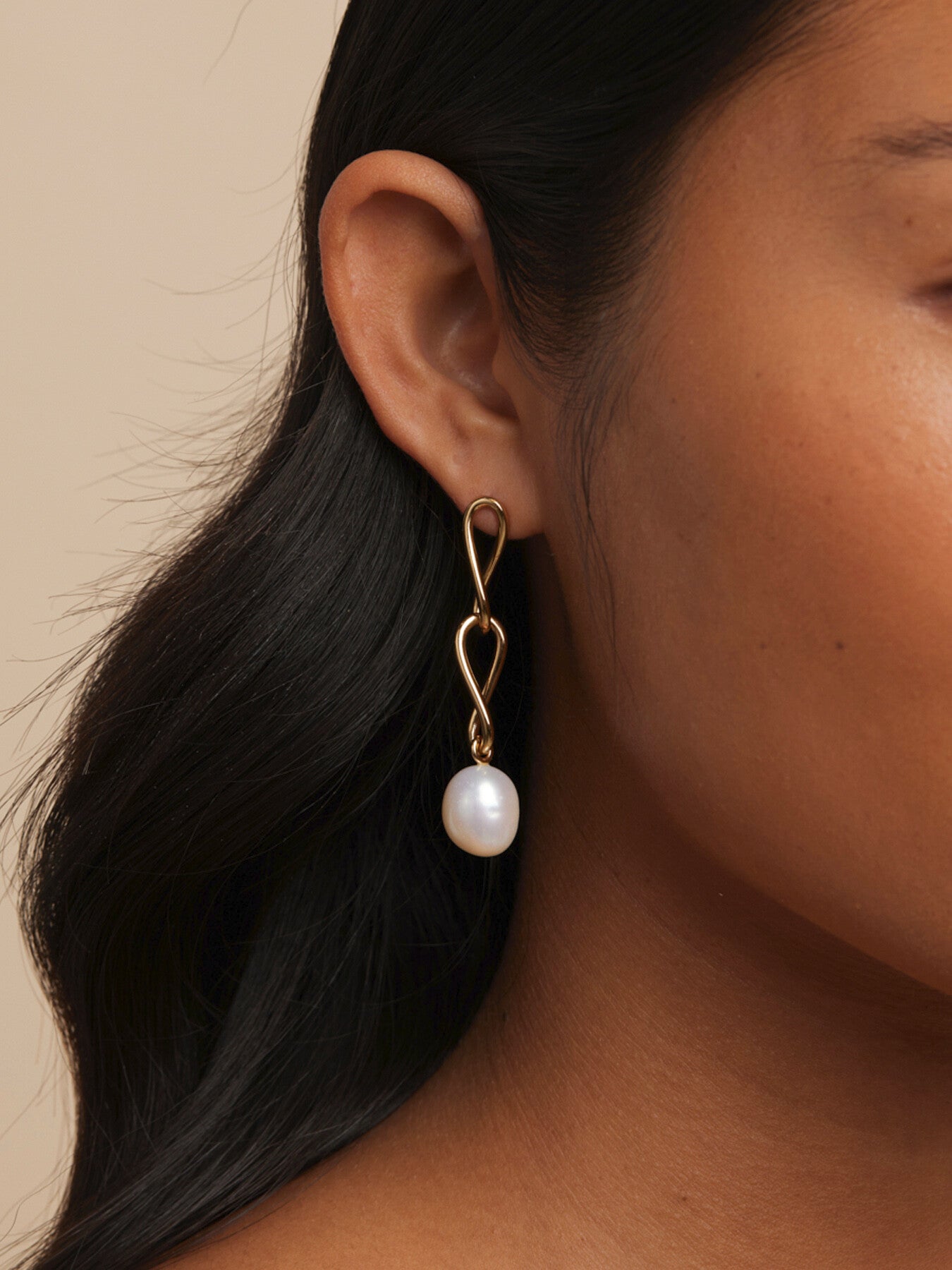 Infinity Pearl Statement Studs
