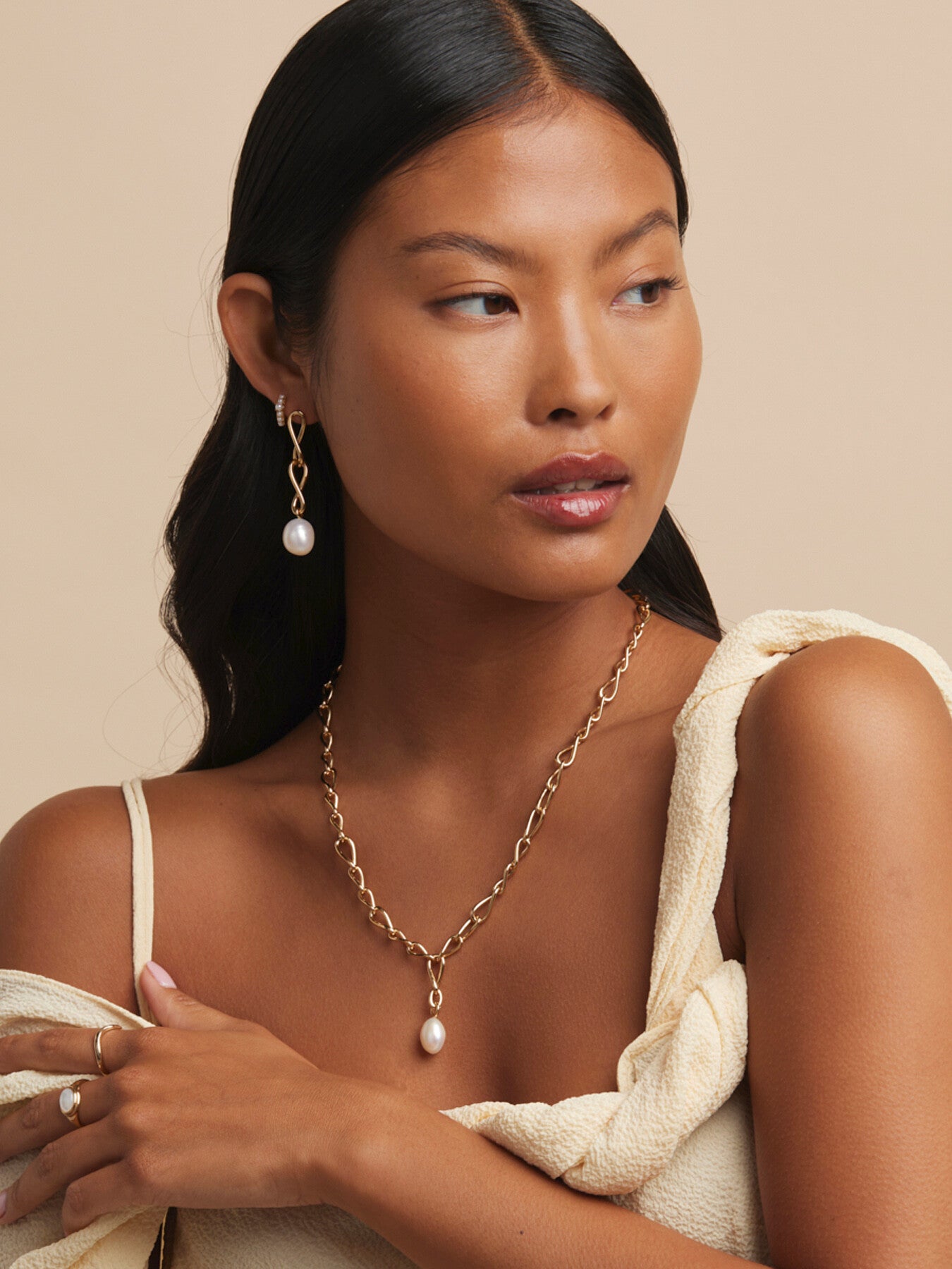 Infinity Pearl Statement Studs