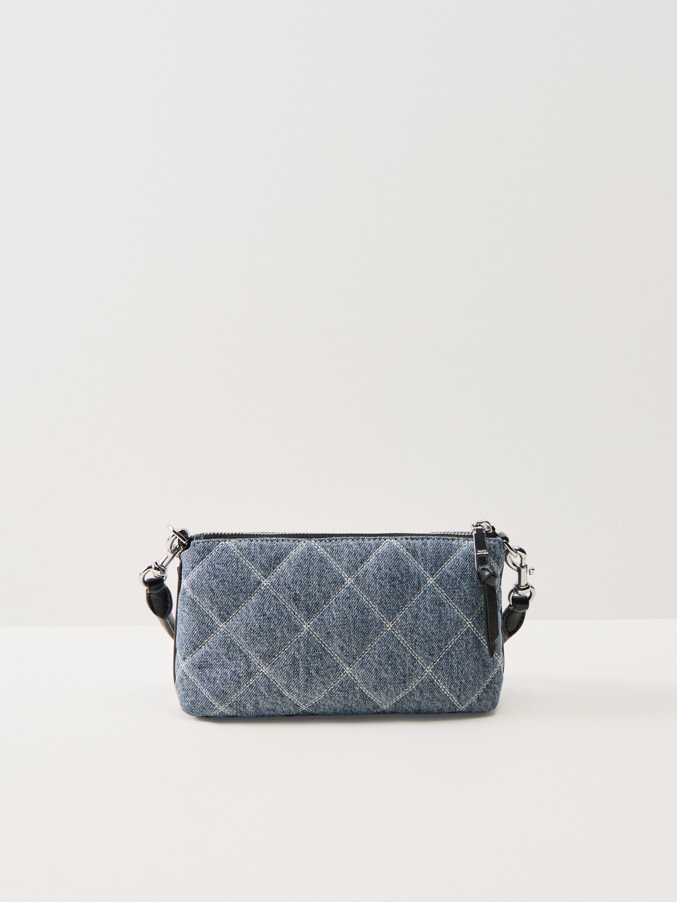 The Quilted Denim Pochette Light Wash Indigo