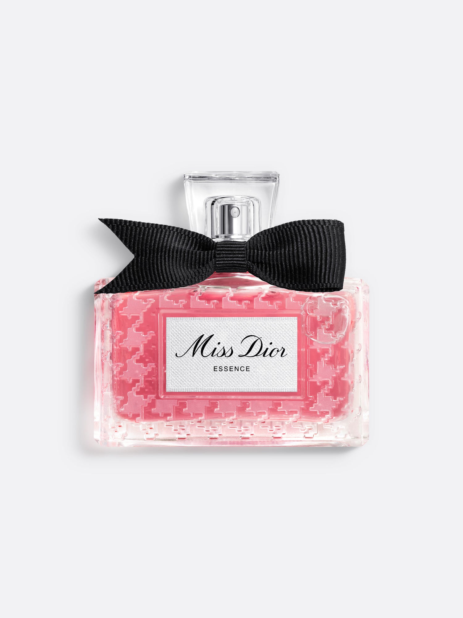 Miss Dior perfume bottle with a black bow on a white background